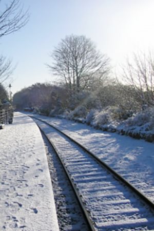 winter train tracks in snow