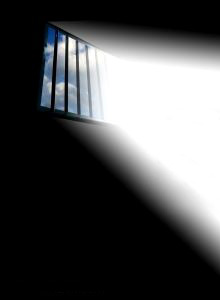 sunlight shining through barred window