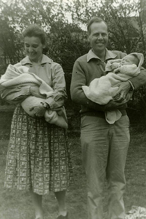 Art and Mary Wiser, each with a baby in their arms.