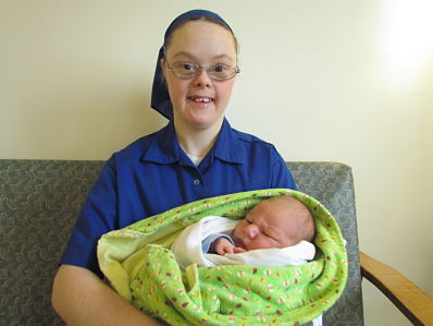 2014 Iris holding her new born nephew