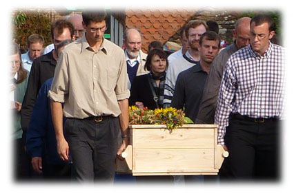 Many young men carry Siegfried's casket