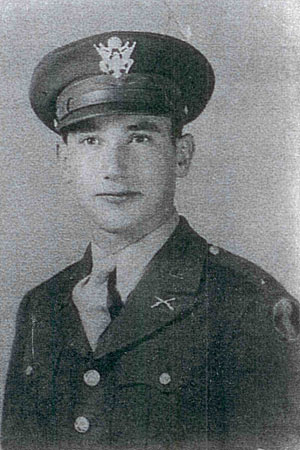An old black and white photograph of Jimmy in uniform.