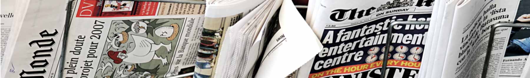 European newspapers in a rack