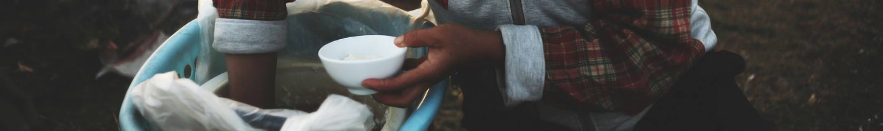 hand holding a bowl