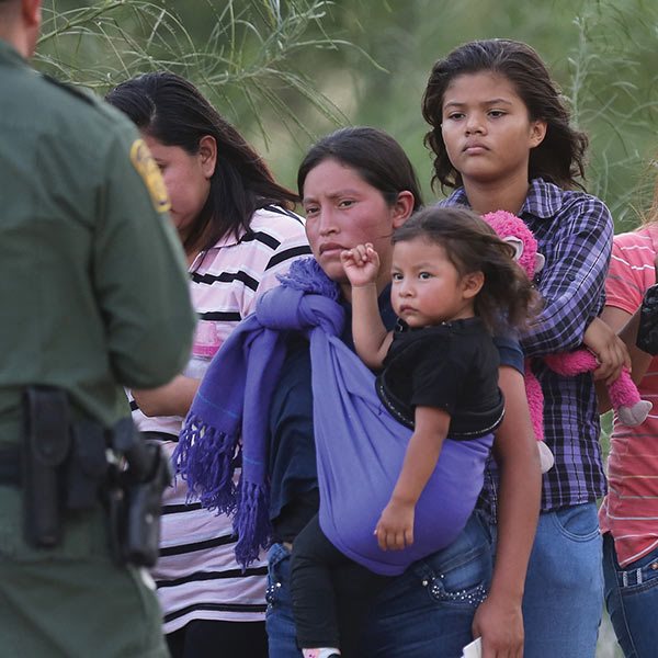 immigrant mother and child at mexican border