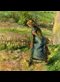 a woman digging in a garden