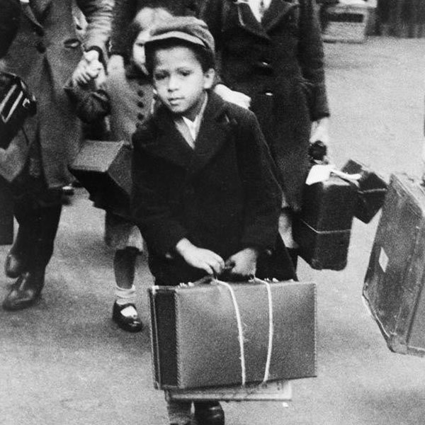 A small boy carrying his luggage as he left London for the country with a party of other evacuees on July 5, 1940.