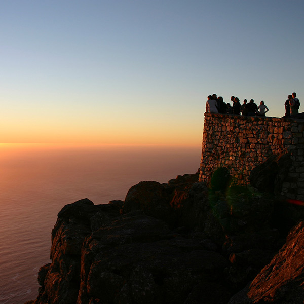 people watching sunset