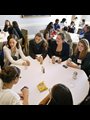 students chatting at table