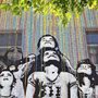 happy kids on a street mural