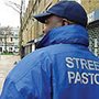street pastor wearing blue windbreader