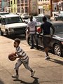 A boy plays in the Sandtown neighborhood of Baltimore