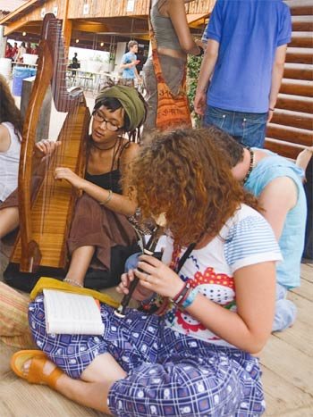 A group of young people playing instruments at Taize in France. 
