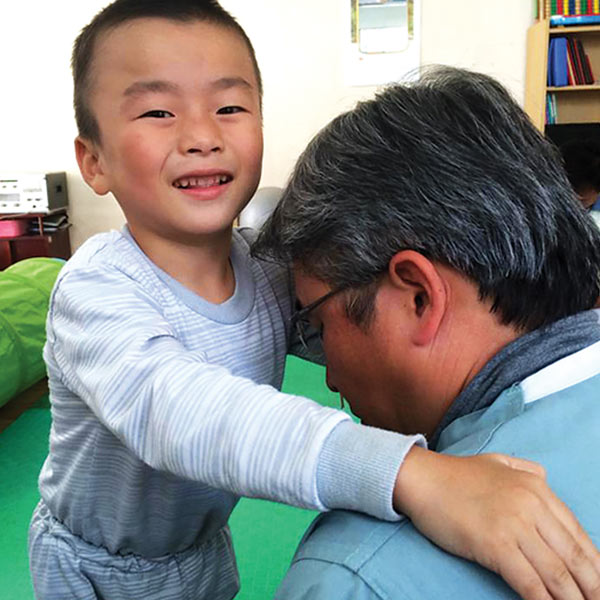 Dr. Stephen Yoon helps children with cerebral palsy.