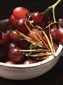 red grapes in a white bowl