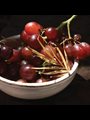 red grapes in a white bowl
