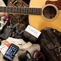 guitar, phone, glove, camera