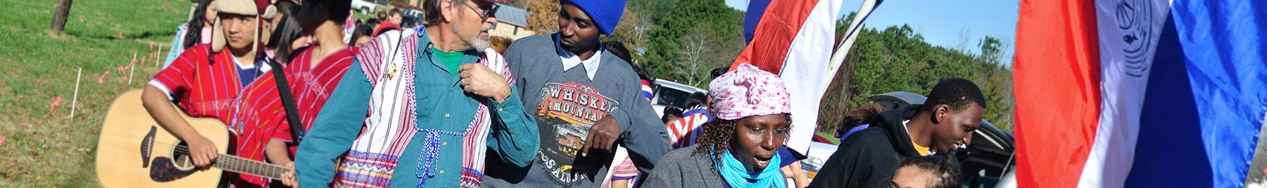 Refugees and Jubilee staff lead the local Christmas parade in Comer, Georgia.