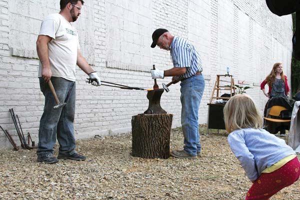 Michael Martin works on a gun.