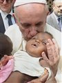 pope francis blessing a baby