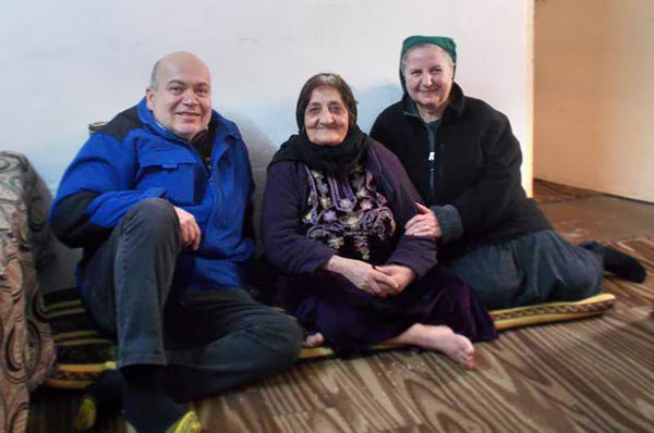 The author and his wife, Layla, with an Iraqi Christian (center) who was injured while escaping ISIS fighters.