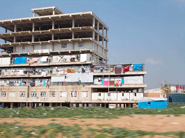 The Al-Amal Hope Center, an unfinished building in Erbil, houses Iraqis who fled Mosul after ISIS militants took control of the area