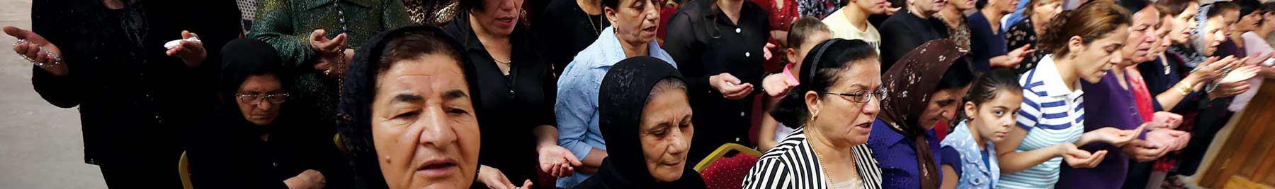 Christians who fled Mosul worship at Erbil’s Mar Shmony Church (June 2016). 