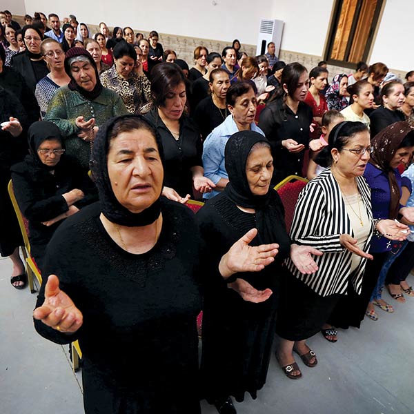 Christians who fled Mosul worship at Erbil’s Mar Shmony Church 