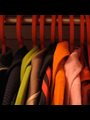Row of coats on hangers