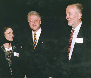 Johann Christoph and Verena Arnold with Bill Clinton (center)