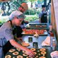 a woman making donuts