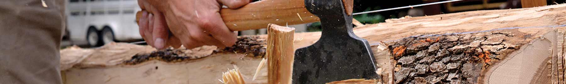 I am hewing the ridge beam for a log cabin