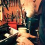 The repair man and his tools: Arnold Mommsen, a Bruderhof member, salvages a typewriter.