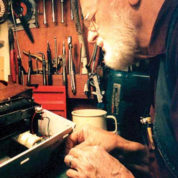 The repair man and his tools: Arnold Mommsen, a Bruderhof member, salvages a typewriter.