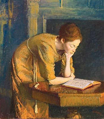 a red haired woman in a yellow dress leaning on a table reading a book