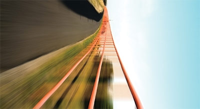 a blurred image of a roller coaster