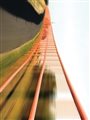 a blurred image of a roller coaster