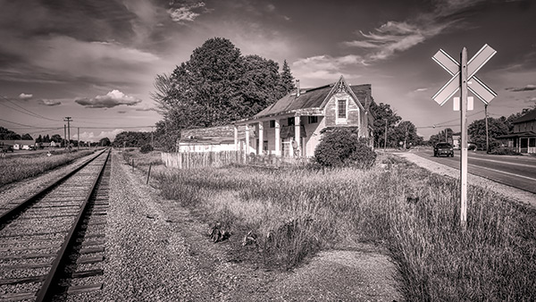 a house by a railroad track