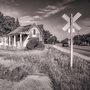 a house by a railroad track