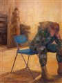 a soldier sitting on a chair with his head in his hands