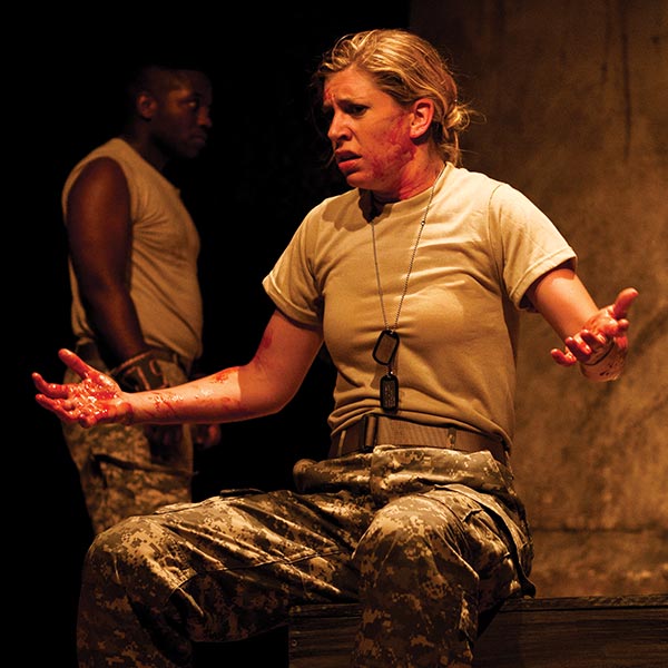 a woman acting on a stage