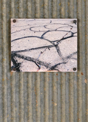 Drawing made on a concrete slab with materials found around the Ranch, 2017