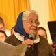 Marlys Swinger introducing one of her choral works