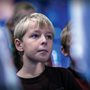 Photograph of a boy in school