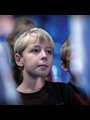 Photograph of a boy in school