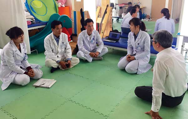 Stephen Yoon coaches doctors in the Pyongyang Medical School Hospital.