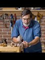 a carpenter working in his workshop