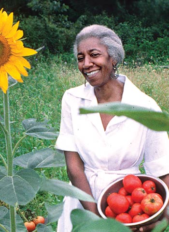 Edna Lewis with a basket of tomatoes
