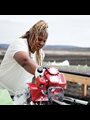 Karen Washington servicing a tiller at Rise & Root Farm in Chester, New York