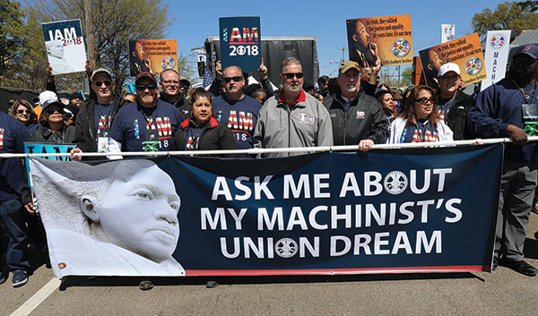 Workers march in Memphis on the 50-year anniversary of Martin Luther King Jr. s assassination, April 2018.